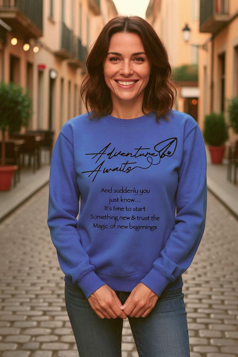 Woman wearing a blue sweatshirt with text on a street